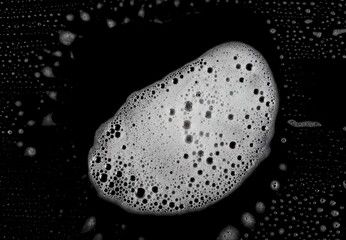 Soap foam, lather bubbles isolated on black background and texture with clipping path