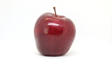 Apples with white spots on the skin, placed on a white background