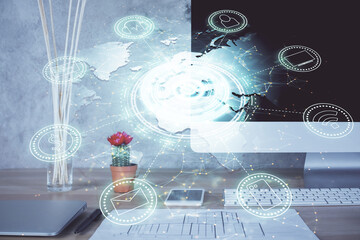 Computer on desktop with social network hologram. Double exposure. Concept of international people connections.