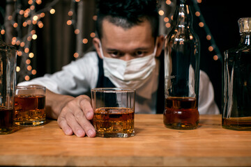 Barman pouring whiskey whiskey glass beautiful night
