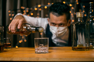 Barman pouring whiskey whiskey glass beautiful night