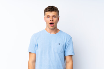 Young handsome man over isolated white background with surprise facial expression