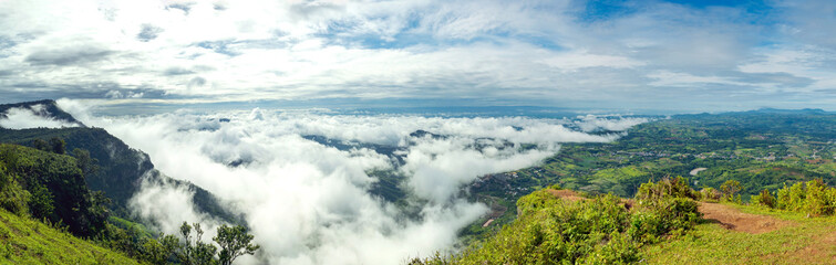 Panoramic view of the clouds covering the city taken from the highest point at the top of the mountain in Thailand.