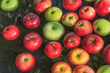 Ripe apples in water