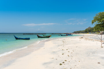 The village Pasir Putih with its dreamlike white sandy beach in the south of the Weh island, Sabang, the northernmost point of Indonesia