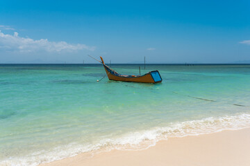 Fototapeta na wymiar Fishing boat at the shore in the south of the island of Weh in Indonesia