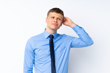Young handsome businessman having doubts and with confuse face expression