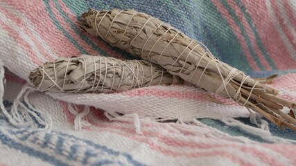 Dried white sage smudge stick, relaxation and aromatherapy. Smudging during psychic occult ceremony, herbal healing, yoga or aura cleaning. Essential incense for esoteric rituals and fortune telling