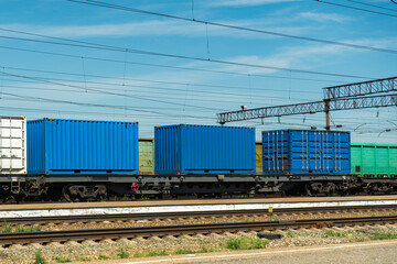 Fototapeta na wymiar Cargo containers at a railway station in Russia