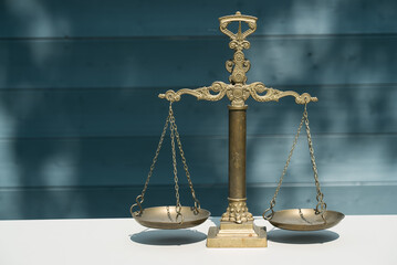 Law and Justice, Legality concept, Justice scale on a wooden background,