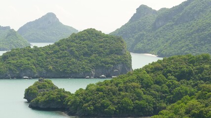 Bird eye panoramic aerial top view of Islands in ocean at Ang Thong National Marine Park near touristic Samui paradise tropical resort. Archipelago in the Gulf of Thailand. Idyllic natural background