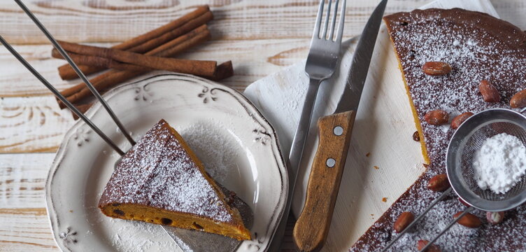 Pumpkin muffin on a white background.Home cooking. Rustic cooking style.