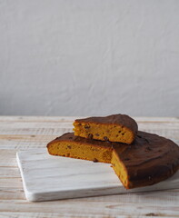 Pumpkin muffin on a white background.Home cooking. Rustic cooking style.