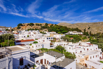 Fototapeta na wymiar View of the picturesque village of Lindos with its traditional white houses, Rhodes island, Dodecanese, Greece.