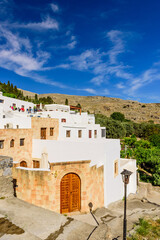 Fototapeta premium View of the picturesque village of Lindos with its traditional white houses, Rhodes island, Dodecanese, Greece.