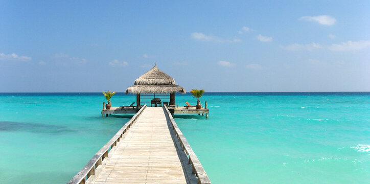 Maledives, tropical Island for a nice holiday or honeymoon. Beautiful white sandy beach with blue lagoon. Kuramathi island resort. ari atol. 