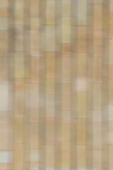 Unevenly colored vertical stripes of the same width light beige, light yellow, light green
