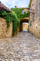 Narrow street in the old town (Peratallada, Catalonia, Spain)