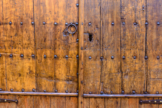 Beautiful brown wooden gate design.