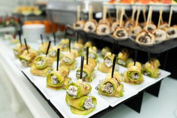 Festive buffet table with many snacks and appetizers