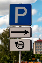 Electric vehicle charging station sign. Parking sign