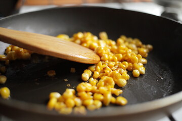 Diet. Organic Grilled Corn in a frying pan. Organic farm vegetables. Vegetarian