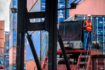 Industrial worker working at cargo freight logistic warehouse for import export, foreman use walkie talkie communication , Import and export business.