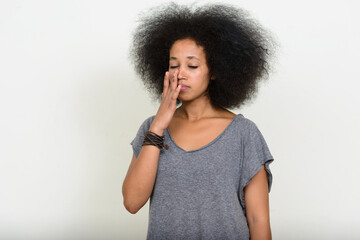 Portrait of young beautiful African woman with Afro hair