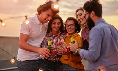 Happy diverse friends proposing toast during party