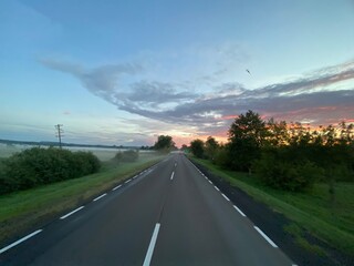 Road in Poland. Sunset. Goldenhour. Beautiful sky.  © Mateusz