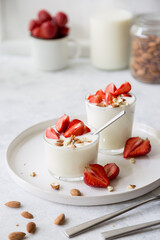 Natural strawberry yogurt with fresh berry and almond