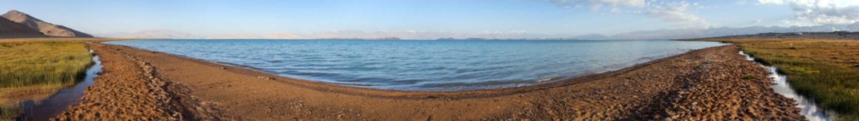 Karakul lake and Pamir range in Tajikistan