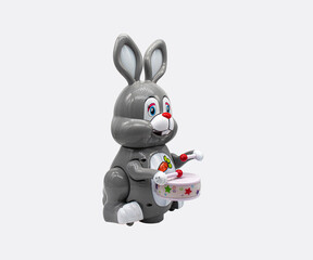 Rabbit with drum, happy gray bunny toy on white background, Isolated, Front angle.