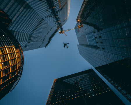 An Airplane Caught Between The Buildings In The Center Of London