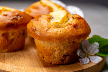 Fresh baked muffins with apple and cinnamon close up
