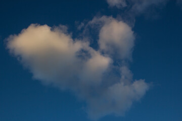 Fototapeta premium Sunset sky with dark shadow of city,close up taken.