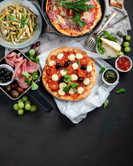 Italian food  on dark background