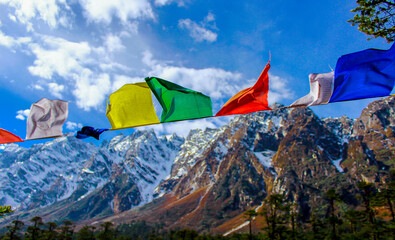 praying flags and mountains