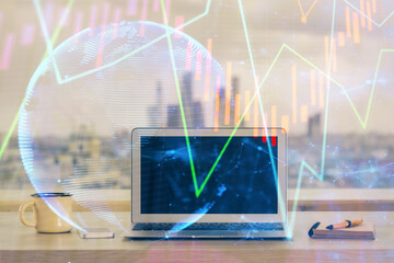 Forex market chart hologram and personal computer background. Multi exposure. Concept of investment.