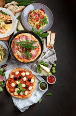 Italian food  on dark background