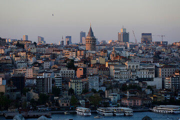 The iconic Galata Tower is seen in the center of the skyline of Istanbul, Turkey, in a picture taken from the Suleymaniye mosque during a summer afternoon.