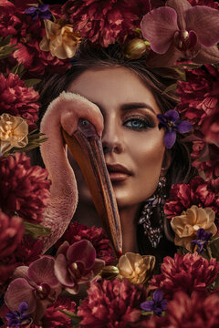 Beautiful woman portrait with bird and flowers