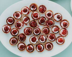 strawberry baked pastry with jam on a plate