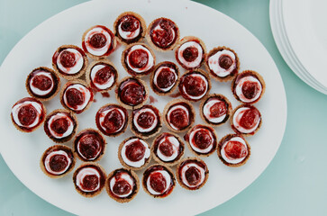 strawberry baked pastry with jam on a plate