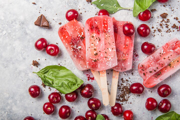 Homemade Vegan Cherry Popsicles with Coconut Milk, basil. Summer food concept top view