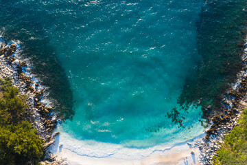 Sunrise over marble beach Porto Vathy in Thassos Island Greece