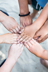 team children Group of children putting their hands together