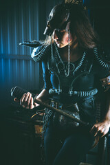 Post apocalyptic woman warrior in armor with the truncheon.