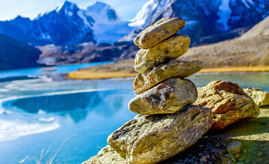 praying stone beside the lake