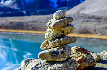 praying stone beside  the lake